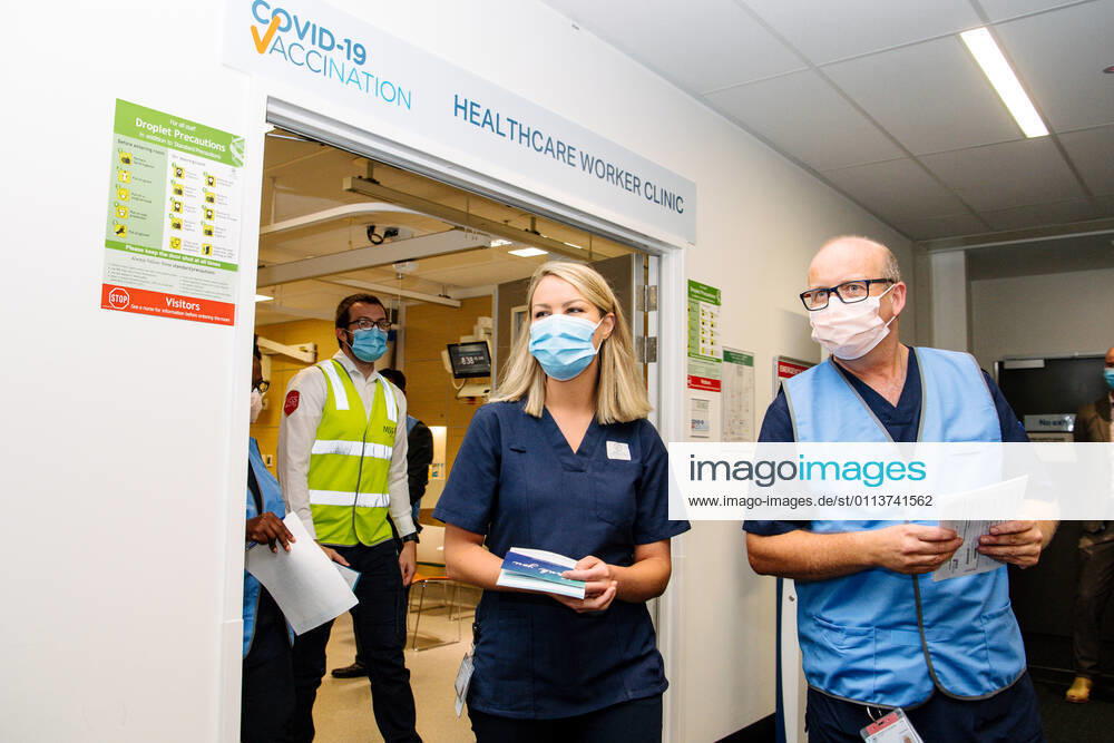 SA COVID19 VACCINE ROLLOUT, Front-line worker CALHN and Medi-hotel Nurse Annabel Thomas (middle) leaves the vaccination room after receiving the Pfizer vaccine at the Royal Adelaide Hospital in Adelaide, Monday, February 22, 2021. Australia will begin its roll out of the Pfizer coronavirus vaccine on Monday, the country s most complicated logistical exercise to date.( NO ARCHIVING, , NO USE IN BOOKS WITHOUT CONSENT ADELAIDE SA AUSTRALIA