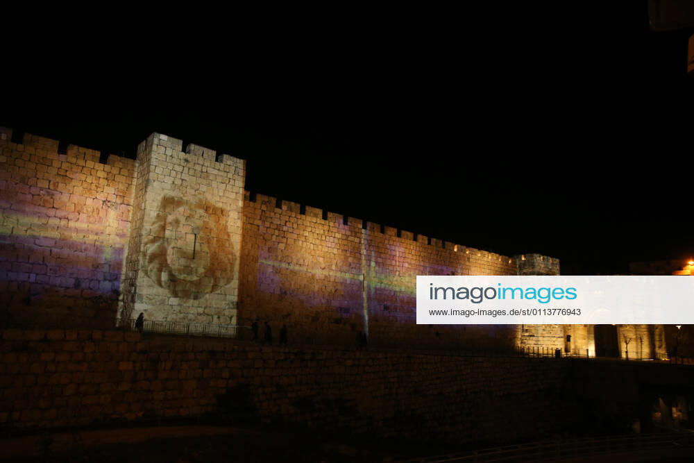 (210222) -- JERUSALEM, Feb. 22, 2021 -- A lightshow as part of the Follow the Lights event launched by Jerusalem s municipal authority amid COVID-19 pandemic is displayed over the wall of Jerusalem s Old city on Feb. 21, 2021. (Photo by Xinhua) MIDEAST-JERUSALEM-LIGHT SHOW MuammarxAwad