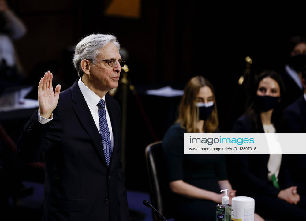 Judge Merrick Garland is sworn in to testify before a Senate Judiciary Committee hearing on his nomination to be U.S. Attorney General as family members listen on Capitol Hill in Washington, U.S., February 22, 2021 Washington USA - ZUMAs152 20210222_zaa_s152_048
