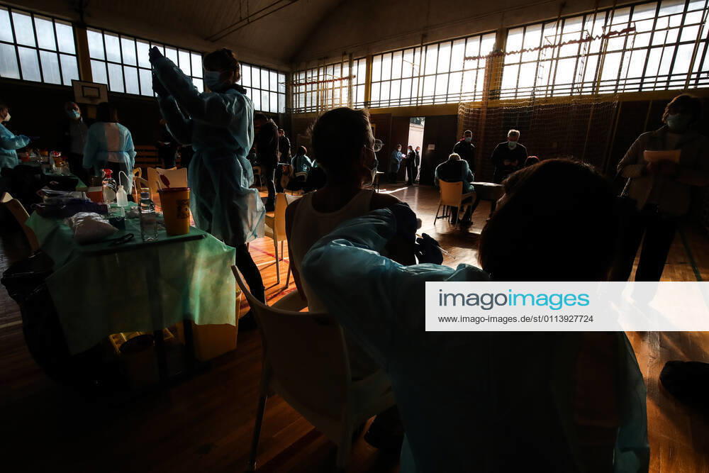 Vaccination in Zagreb, Croatia A woman receive coronavirus disease (COVID-19) vaccine during a mass vaccination in Zagreb, Croatia on February 23, 2021. SanjinxStrukic PIXSELL
