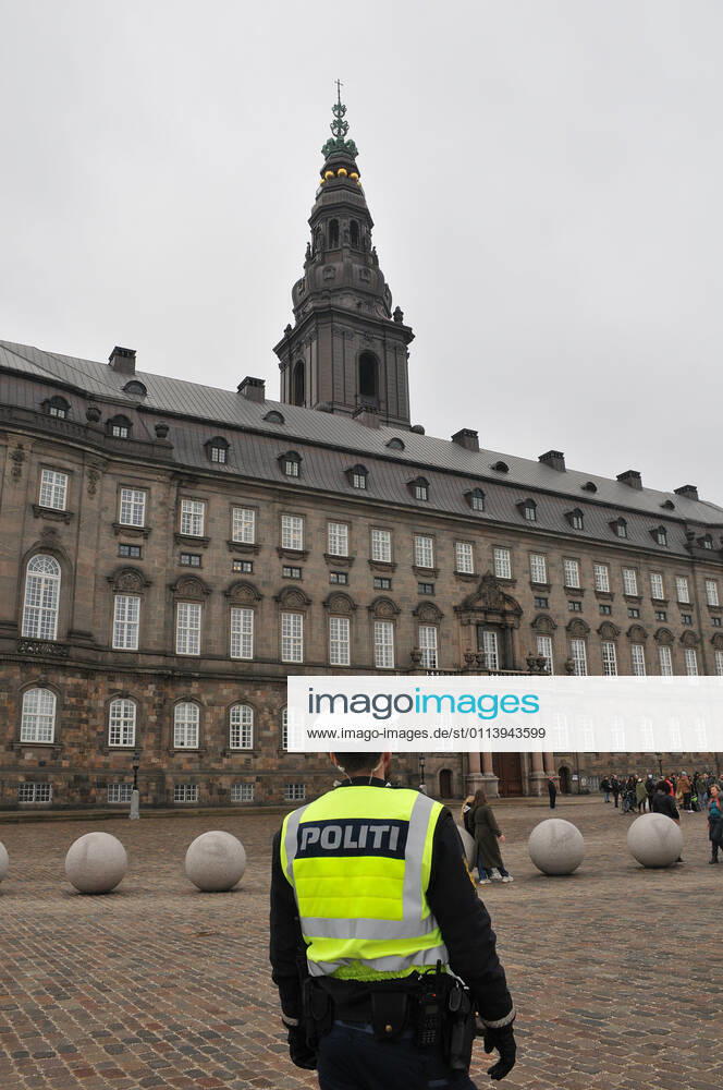Copenhagen, Denmark. 23 February 2021, Danes proetesting againest coronavirus pandemic new debate in danish parliamenet about quick corona virus pandemic law in danish parliament with all political parties and stage anti pandemic law debates in front of danish parliament and danish police stand peaceful proteact danish parliament in front christiansborg danish parliament in Copenhagen. (Photo..Francis Dean Deanpictures)