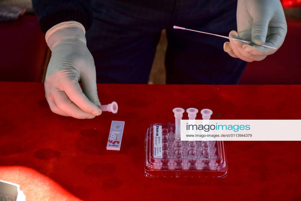 A health worker holds swab samples collected from local people for antigen rapid test for (COVID-19) Coronavirus at a coronavirus testing center in Srinagar. Jammu and Kashmir recorded 58 new COVID-19 cases which took the infection tally to 1,25,925, officials said. A senior doctor has warned of a second wave of COVID 19 infections, the warning has come at a time when Kashmir valley is witnessing a sharp decrease in daily cases..Jammu and Kashmir recorded 58 new COVID-19 cases which took the infection tally to 125,925, officials said. A senior doctor has warned of a second wave of COVID 19 infections, the warning has come at a time when Kashmir valley is witnessing a sharp decrease in daily cases. Srinag - ZUMAs197 20210223_zaa_s197_026