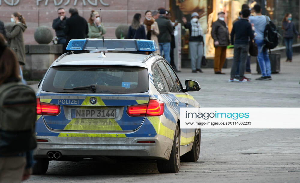 Polizei make a Kontrolle about the Mask Use during the Hard Lockdown of the Covid 19 Coronavirus Pandemie in Nurnberg , Bayern , Deutschland . February 24, 2021.