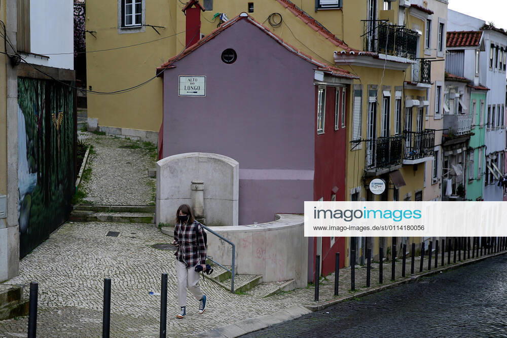 A woman wearing a face mask is seen in Lisbon, Portugal on February 25, 2021. Portugal s parliament approved on Thursday the renewal of the state of emergency in the country through March 16, allowing the government to keep all lockdown and anti-COVID-19 measures in place. Lisbon Portugal - ZUMAf123 20210225_zap_f123_005