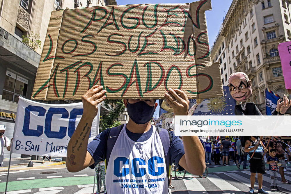 Different social organizations gathered, in the center of the City of Buenos Aires, to demand the continuity of employment of 2,500 cooperative members of the Clean Sideways Program of the Government of the City of Buenos Aires, among other demands. Buenos Aires Argentina - ZUMAa179 20210225_zap_a179_002