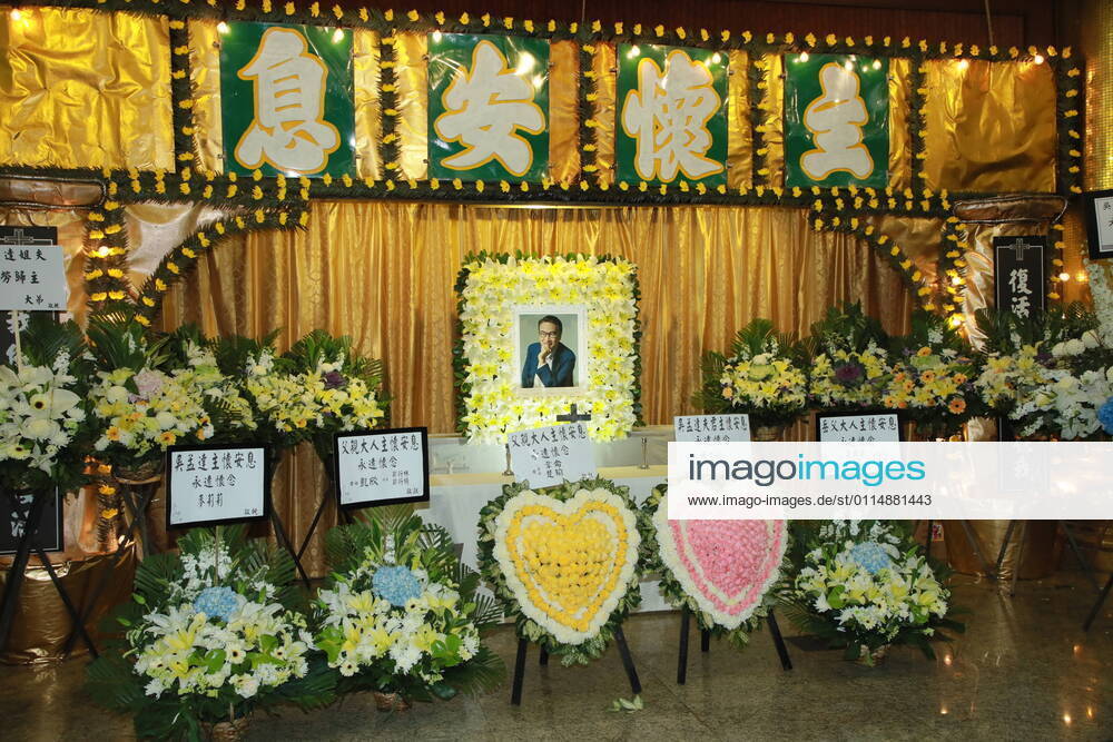 Flower wreaths adorn the portrait of deceased actor Ng Man-tat during a memorial service on March 7, 2021 in Hong Kong, China. Actor Ng Man-tat died of liver cancer on February 27 in Hong Kong.