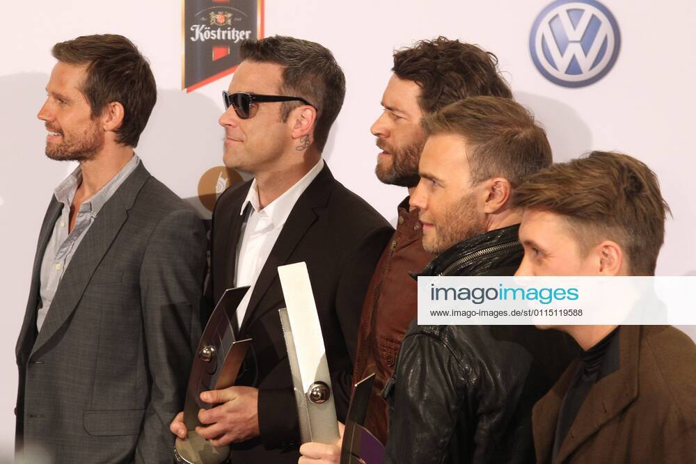 Preistraeger Take That mit Robbie Williams beim Echo 2011 - dem Deutschen Musikpreis an der Preistraeger Wand in der Messe Berlin am Funkturm. Es ist der 20. Echo. 20 Jahre Echo.