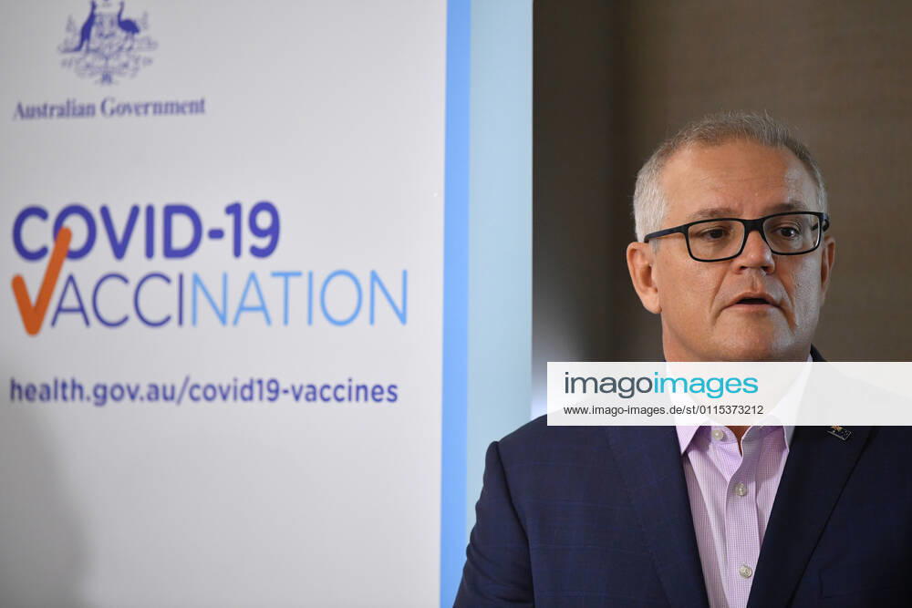 SCOTT MORRISON COVID19 VACCINATION, Australian Prime Minister Scott Morrison speaks to media after receiving his second COVID-19 vaccination during a visit to Castle Hill Medical Centre in Sydney, Sunday, March 14, 2021. ( NO ARCHIVING, , NO USE IN BOOKS WITHOUT CONSENT SYDNEY NSW AUSTRALIA