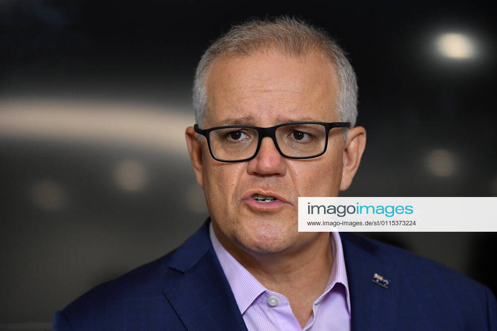 SCOTT MORRISON COVID19 VACCINATION, Australian Prime Minister Scott Morrison speaks to media after receiving his second COVID-19 vaccination during a visit to Castle Hill Medical Centre in Sydney, Sunday, March 14, 2021. ( NO ARCHIVING, , NO USE IN BOOKS WITHOUT CONSENT SYDNEY NSW AUSTRALIA