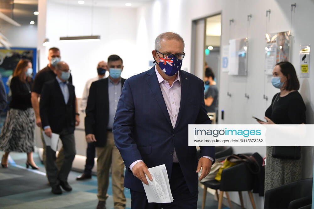 SCOTT MORRISON COVID19 VACCINATION, Australian Prime Minister Scott Morrison arrives to speak to media after receiving his second COVID-19 vaccination during a visit to Castle Hill Medical Centre in Sydney, Sunday, March 14, 2021. ( NO ARCHIVING, , NO USE IN BOOKS WITHOUT CONSENT SYDNEY NSW AUSTRALIA