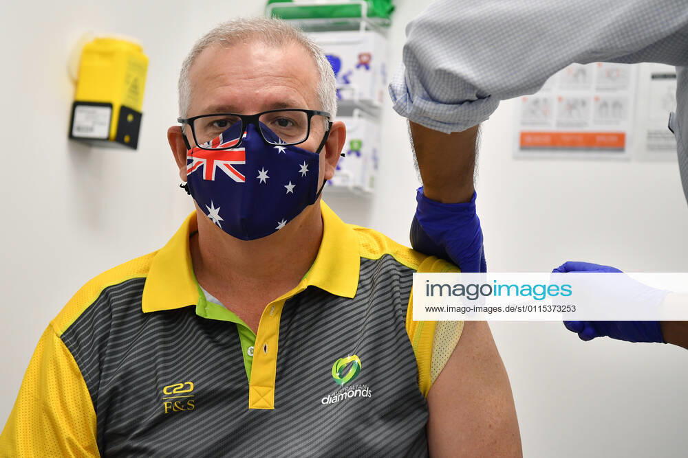 SCOTT MORRISON COVID19 VACCINATION, Australian Prime Minister Scott Morrison receives his second COVID-19 vaccination during a visit to Castle Hill Medical Centre in Sydney, Sunday, March 14, 2021. ( NO ARCHIVING, , NO USE IN BOOKS WITHOUT CONSENT SYDNEY NSW AUSTRALIA