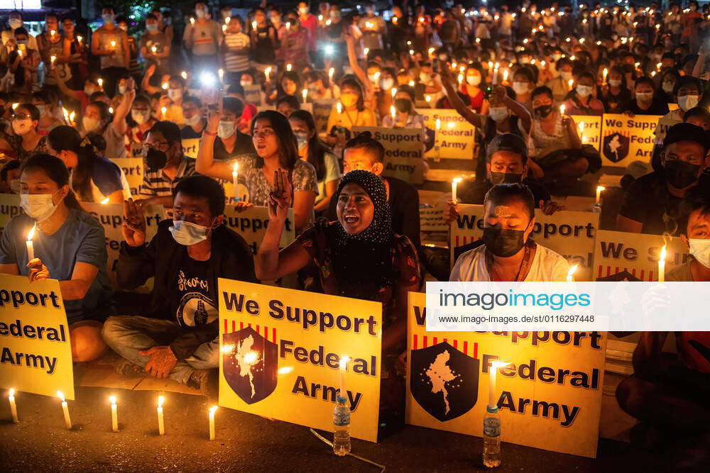 Protesters hold burning candles and placards expressing their opinion during the protest against military coup in Yangon..Death toll has risen to at least 543 people and more than 3740 people were arrested since the military coup in February 1..Myanmar s military detained State Counsellor of Myanmar Aung San Suu Kyi on February 01, 2021 and declared a state of emergency while seizing the power in the country for a year after losing the election against the National League for Democracy Yangon Myanmar - ZUMAs197 20210402_zaa_s197_072