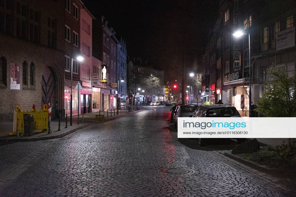 Like an abandoned city. Aachen on Easter vigil between 10 p.m. and 11 p.m. View into the deserted Kleinmarschierstrasse. In Aachen on April 3, 2021. GERMANY - AACHEN - EASTER Easter 2021 Covid Pandemic