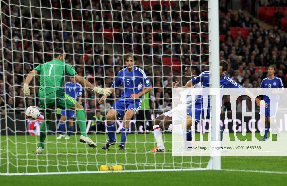 England s Danny Welbeck scoring his sides fourth goal..England v San Marino - FIFA World Cup Qualifier - Wembley Stadium- 12 10 12 - Picture David Klein Sportimage .