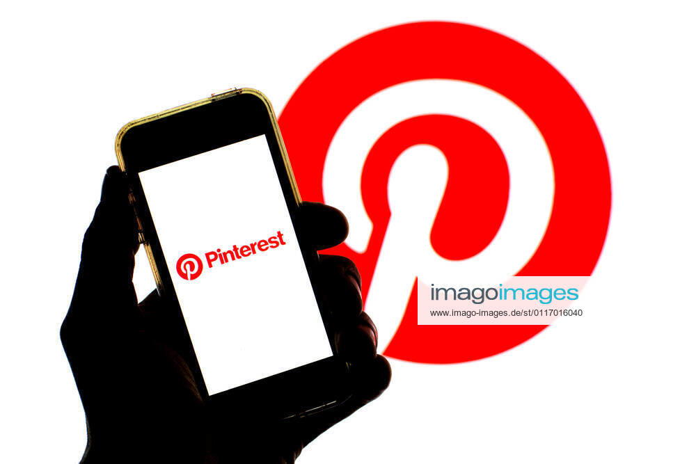 In this photo illustration a Pinterest app seen displayed on a smartphone screen with a Pinterest logo in the background. Barcelona Spain - ZUMAd159 20210429_zia_d159_008