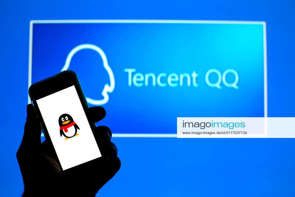 In this photo illustration, the Tencent QQ app seen displayed on a smartphone screen and a Tencent QQ logo in the background. Barcelona Spain - ZUMAd159 20210430_zia_d159_021