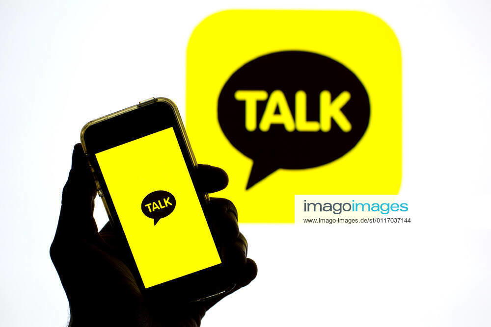 In this photo illustration, the KakaoTalk app seen displayed on a smartphone screen and a KakaoTalk logo in the background. Barcelona Spain - ZUMAd159 20210430_zia_d159_025