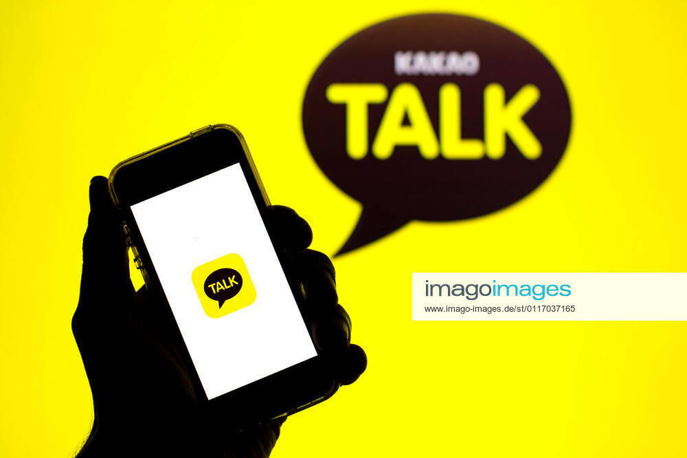 In this photo illustration, the KakaoTalk app seen displayed on a smartphone screen and a KakaoTalk logo in the background. Barcelona Spain - ZUMAd159 20210430_zia_d159_028