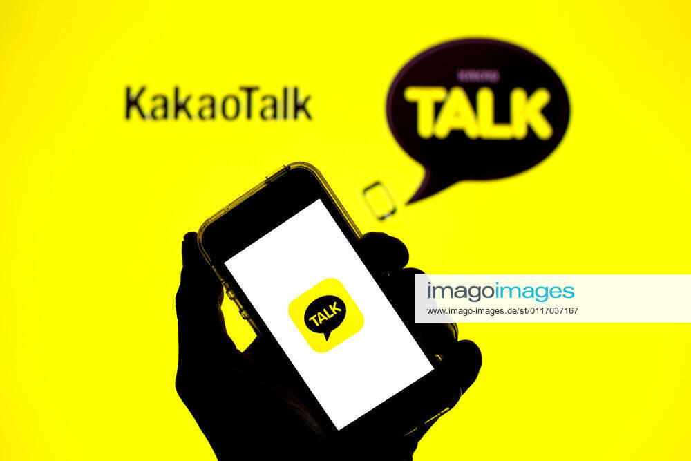 In this photo illustration, the KakaoTalk app seen displayed on a smartphone screen and a KakaoTalk logo in the background. Barcelona Spain - ZUMAd159 20210430_zia_d159_029