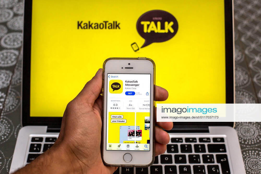 In this photo illustration, the KakaoTalk app in App Store seen displayed on a smartphone screen and a KakaoTalk logo on a laptop in the background. Barcelona Spain - ZUMAd159 20210430_zia_d159_001