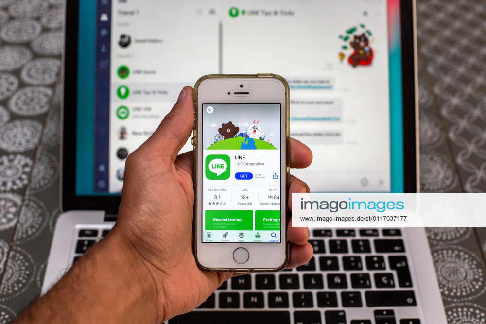 In this photo illustration, the Line app in App Store seen displayed on a smartphone screen and a Line Desktop on a laptop in the background. Barcelona Spain - ZUMAd159 20210430_zia_d159_008