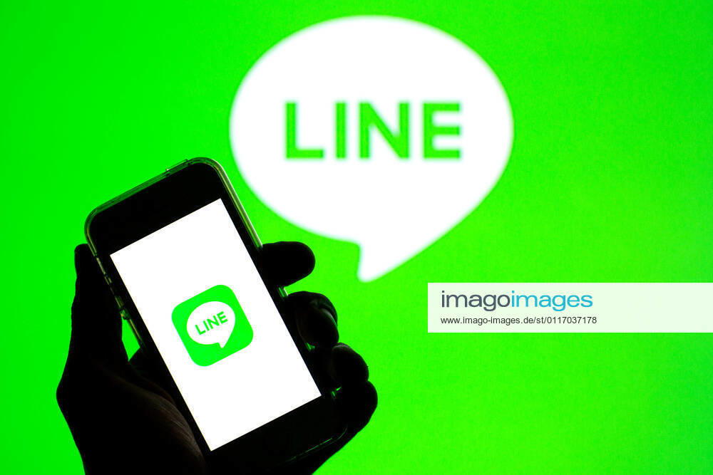 In this photo illustration, the Line app seen displayed on a smartphone screen and a Line logo in the background. Barcelona Spain - ZUMAd159 20210430_zia_d159_016