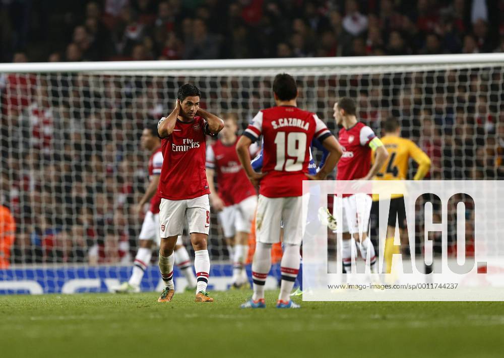 Arsenal s Mikel Arteta looks on dejected after going 1-0 down..Arsenal London vs FC Schalke 04 - Champions League Group Match - The Emirates Stadium, London- 24 10 12 - .
