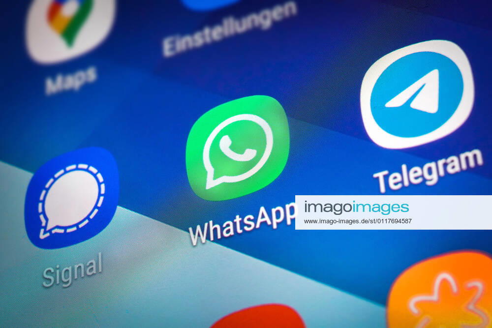 Logos der Social-Media Messenger-Apps Telegram, WhatsApp und Signal auf dem Bidschirm eines Smartpones
