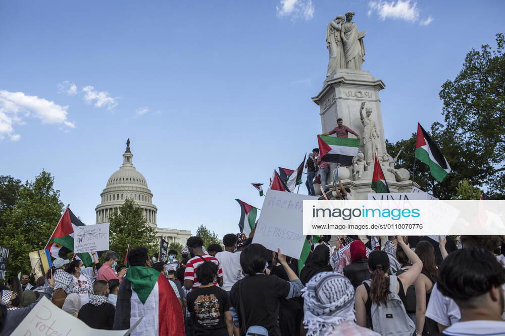 Activists and protesters take part in a rally in support of Palestinians in Washington, DC, United States on May 15, 2021. Demonstrators gathered near the Washington monument and marched towards the Capitol building, carrying Palestinian flags and banners. Washington USA - ZUMAr125 20210515_zap_r125_003