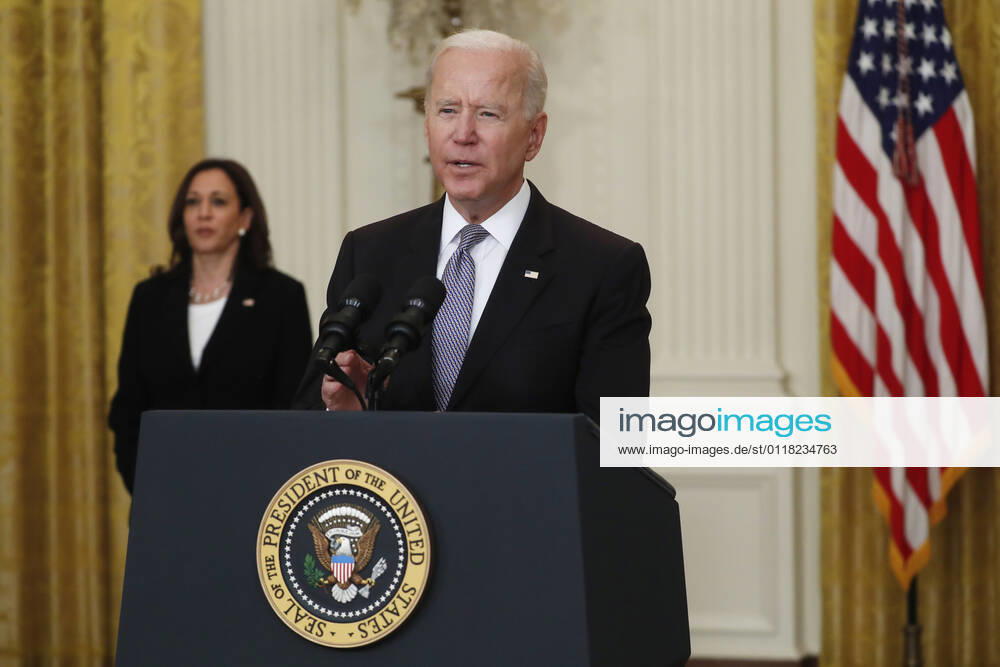 United States Vice President Kamala Harris (L) listens as US President Joe Biden delivers remarks on the COVID-19 response and the vaccination program from the East Room of the White House in Washington, DC, USA, 17 May 2021. The President announced the US will share its excess vaccines with other nations Washington USA - ZUMAs152 20210517_zaa_s152_032