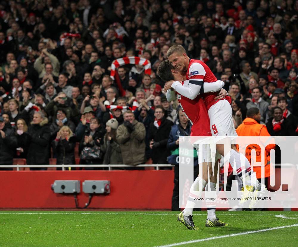 Arsenal s Lukas Podolski celebrates scoring his sides second goal. FC Arsenal London v HSC Montpellier -Champions League- Emirates Stadium, London- 21 11 12 - Picture DavidxKlein Sportimage .