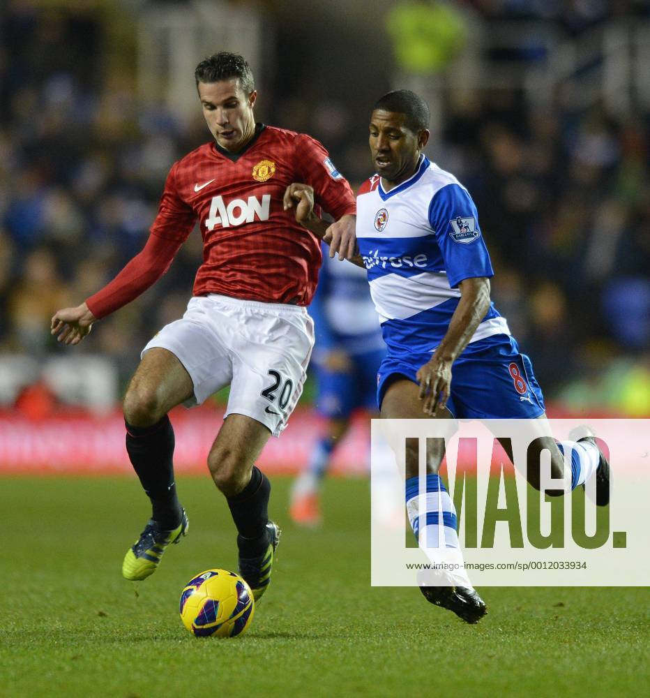 Football - Barclays Premier League - Reading vs. Manchester United Mikele Leigertwood of Reading and Robin van Persie of Manchester United in action at the Madejski Stadium, Reading