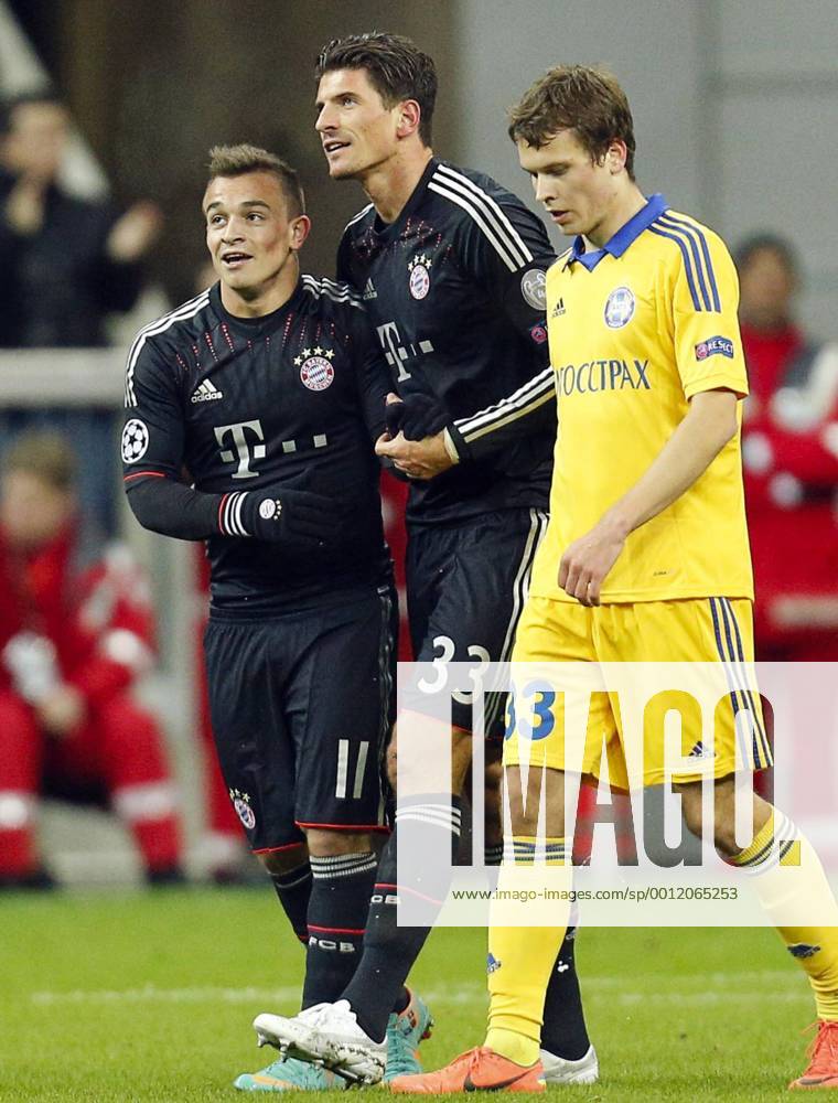 Mario Gomez ( Bayern 33 ) jubelt nach dem Tor zum 1-0 mit Xherdan SHAQIRI, FCB 11 , Denis POLYAKOV 33 Emotionen, enttäuscht, Enttäuschung, Frust, frustriert, Trauer ,traurig, verzweifelt, Verzweiflung FC BAYERN MÜNCHEN - BATE BORISOV BORISSOW Fussball UEFA Champions League, Gruppenphase, Muenchen, 05.12.2012 CL Saison 2012 2013, FCB, Muenchen, Bor