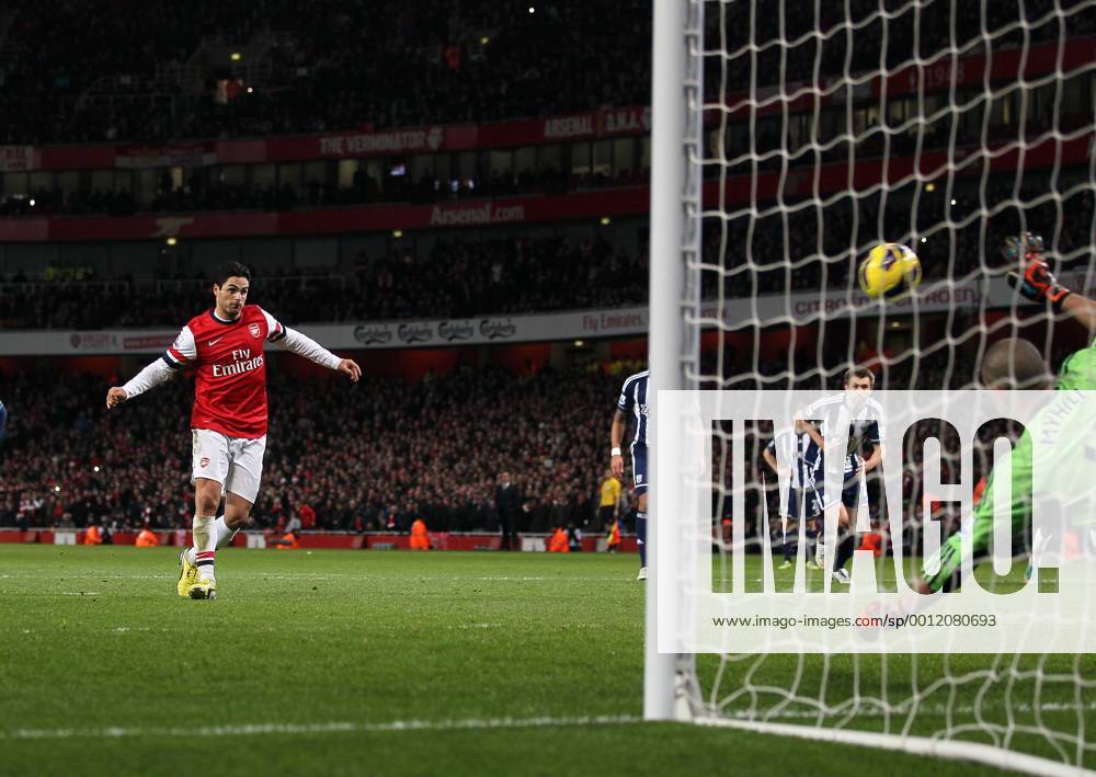Arsenal s Mikel Arteta scoring his sides second goal from the penalty spot..Arsenal FC London v West Bromwich Albion - Premier League - Emirates Stadium, London- 8 12 12 - Picture David Klein Sportimage .