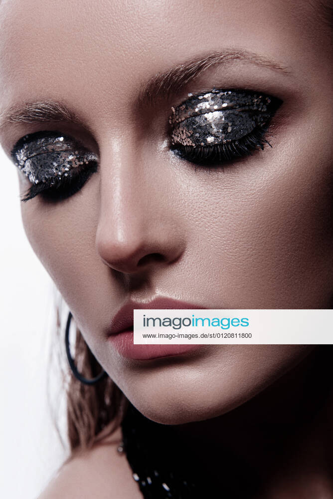 Fashion style girl portrait. Beautiful fashion woman with professional styling, hairdress and makeup; dark glitter eyeshadows, rock style beauty portrait Belarus, Mogilev Region, Belarus CR_PJWUOI210608B-761195-01 ,model released, Symbolfoto