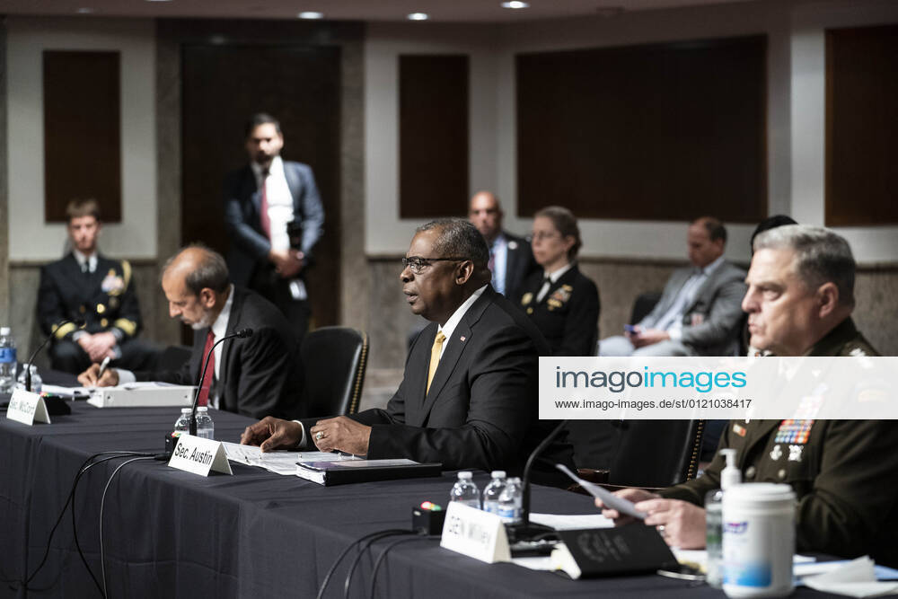 U.S. Secretary of Defense General Lloyd Austin, center, and Chairman of the Joint Chiefs of Staff Gen. Mark Milley, right, testify before the Senate Armed Services Committee at the U.S. Capitol in Washington DC, on Thursday, June 10, 2021. The committee heard testimony the Defense Department budget posture in review of the Defense Authorization Request for FY2022. WAP20210610569 SARAHxSILBIGER