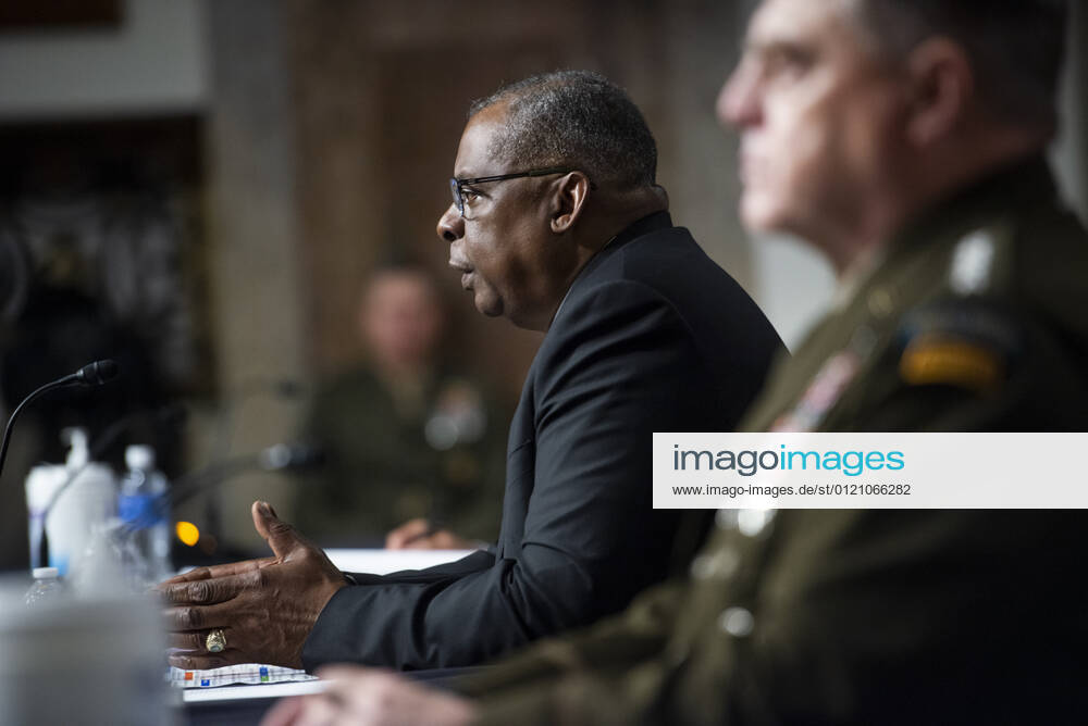 US Secretary of Defense Lloyd Austin III, left, and General Mark Milley, Chairman of the Joint Chiefs of Staff, right, appear before a Senate Committee on Armed Services hearing to examine the Department of Defense budget posture in review of the Defense Authorization Request for fiscal year 2022, in the Dirksen Senate Office Building in Washington, DC, Thursday
