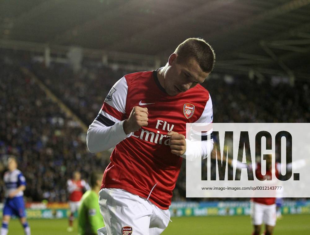 Arsenal s Lukas Podolski celebrates scoring his sides opening goal Reading v Arsenal - Premier League - Madejski Stadium, Reading- 17 12 12 - Picture David Klein Sportimage .