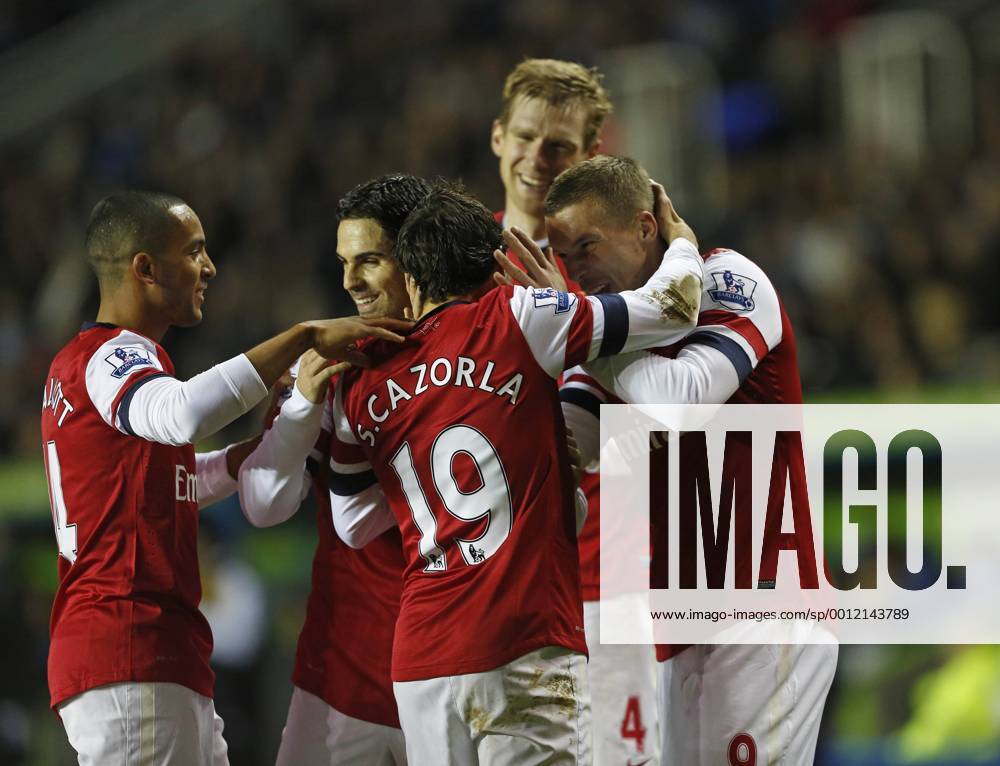 Arsenal s Lukas Podolski celebrates scoring his sides opening goal Reading v Arsenal - Premier League - Madejski Stadium, Reading- 17 12 12 - Picture David Klein Sportimage .