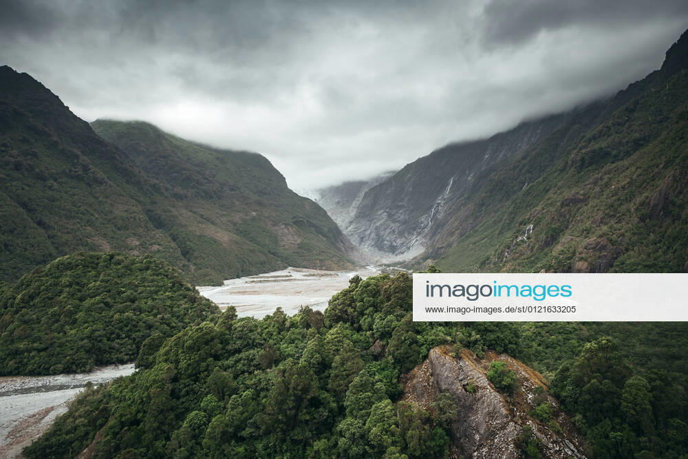 New Zealand, South Island, Franz Josef Glacier surrounded by mountains WVF01924