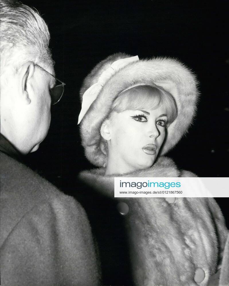Arriving at court in a styling mink coat, JACQUELINE-CHARLOTTE DUFRESNOY, 31, who goes by the alias Coccinelle, is a French actress, entertainer and singer. Transgender, and the first widely publicized post-war gender reassignment case in Europe, where she is an international celebrity and a renowned club singer. At the courthouse to meet with President Voisenet, who was supposed to help her reconcile with her husband French journalist Francis-Paul Bonnet and was married legally by the French Roman Catholic Church after her legal name change and rebaptism. Her marriage to Bonnet was dissolved in 1962. Paris France - ZUMAk09_ 19621113_baf_k09_003