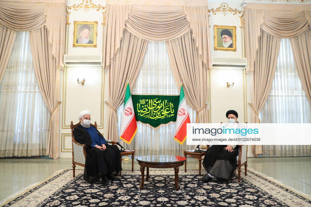 A handout photo made available by the presidential office shows, Iranian president HASSAN ROUHANI (L) and president-elect EBRAHIM RAISI (R) during a meeting in Tehran, Iran, 19 June 2021. Rouhani congratulated Raisi for winning the presidential election. According to an interior ministry official, Raisi won 17.8 million votes, so far. More than 28 million Iranians out of 59 million eligible voters had cast their ballots in the Iranian Presidential election. Iran s hard-line judiciary chief won the country s presidential election in a landslide victory Saturday, propelling the supreme leader s protege into Tehran s highest civilian position in a vote that appeared to see the lowest turnout in the Islamic - ZUMAi98_ 20210619_zih_i98_006