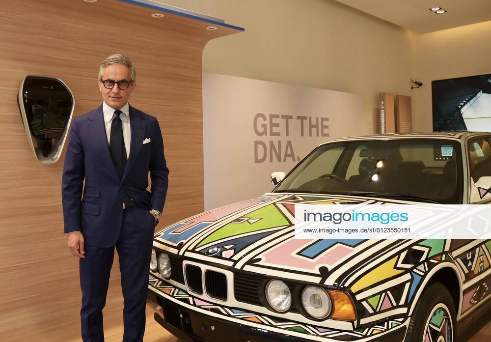 Milan, Italy BMW Milano Urban Store The speed of the arts. Science Massimiliano Di Silvestre president AD BMW Italia presents the BMW 525i from 1991 created by Art Car in artistic graphics by Esther Mahlangu African painter and artist, the first woman to have created for Art Car In the photo : Massimiliano Di Silvestre president of AD BMW Italy
