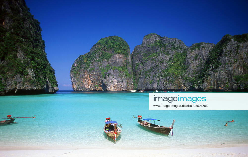 Ko Phi Phi consists of two islands, Phi Phi Leh and Phi Phi Don, located southeast of Phuket. Both are part of Hat Noppharat Thara Ko Phi Phi National Marine Park.<br ><br > Set in the centre of the Sea of Phuket, Ko Phi Phi is almost equidistant from Phuket and Krabi and can be reached by boat in around two hours.<br ><br > Phi Phi Don is the larger of the two islands, with scenic hills, steep cliffs, silken beaches, azure waters and remarkable bird- and sea-life. The island narrows at the middle where long, white-sand beaches are only a few hundred metres apart. Boats from Krabi and Phuket dock at Ao Ton Sai on the southern side of the island. Hat Yao or Long Beach faces south and is famous for the good snorkelling to be had on its co MediaxCo.xLtd.x