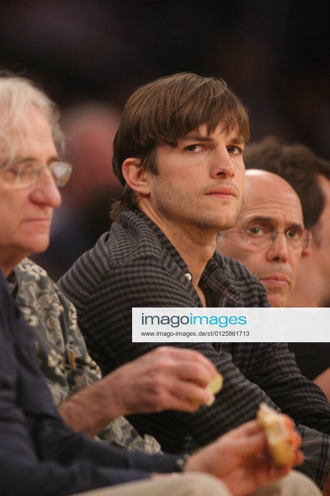 Los Angeles, CA, United States - April 3, 2012; Ashton Kutcher, Jeffery Katzenberg and Jack Black having a good time at the Lakers game. The Los Angeles Lakers defeated the New Jersey Nets by the final score of 91-87 at Staples Center in downtown Los Angeles, CA. Los Angeles USA - ZUMAr03_ 20120403_zaf_r03_004