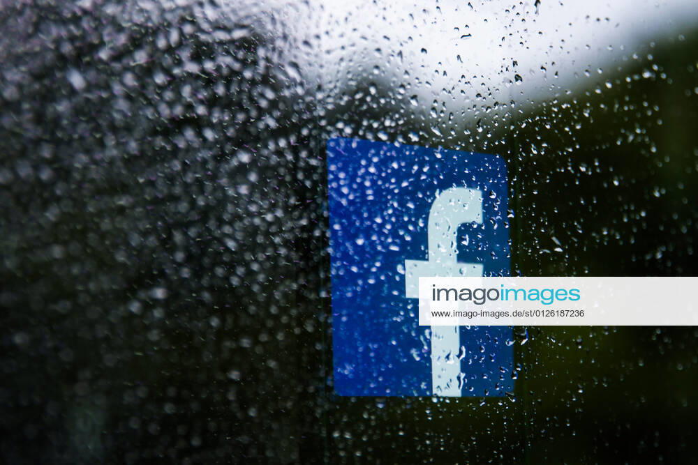 TikTok And Facebook Photo Illustrations Facebook logo displayed on a phone screen is seen through raindrops on the window in this illustration photo taken in Krakow, Poland on July 17, 2021. (Photo Ilustration by Jakub Porzycki NurPhoto) Krakow Poland porzycki-tiktokan210717_npbFl