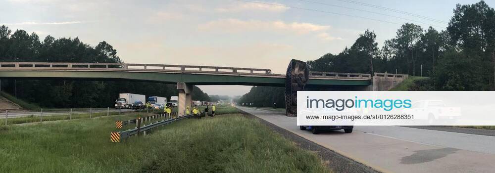 A truck hit a bridge so hard it shunted it six feet. These shocking pictures show the aftermath of the crash in Georgia, USA, on Thursday (15 July). The overpass crosses Interstate 16 in Treutlen County, which had to be closed following the accident. A Georgia Department of Transportation spokesman said a dump truck carrying large tyres was driving at between 1:00-1:30am with its dump trailer up when it struck the bridge. He explained: It actually moved the bridge off its set mark just under six feet, which is something a lot of our engineers have never seen before. They confirmed the driver was OK. Georgia DOT managed to completely demolish the bridge by Friday morning. They reported: Overnight and early Friday morn