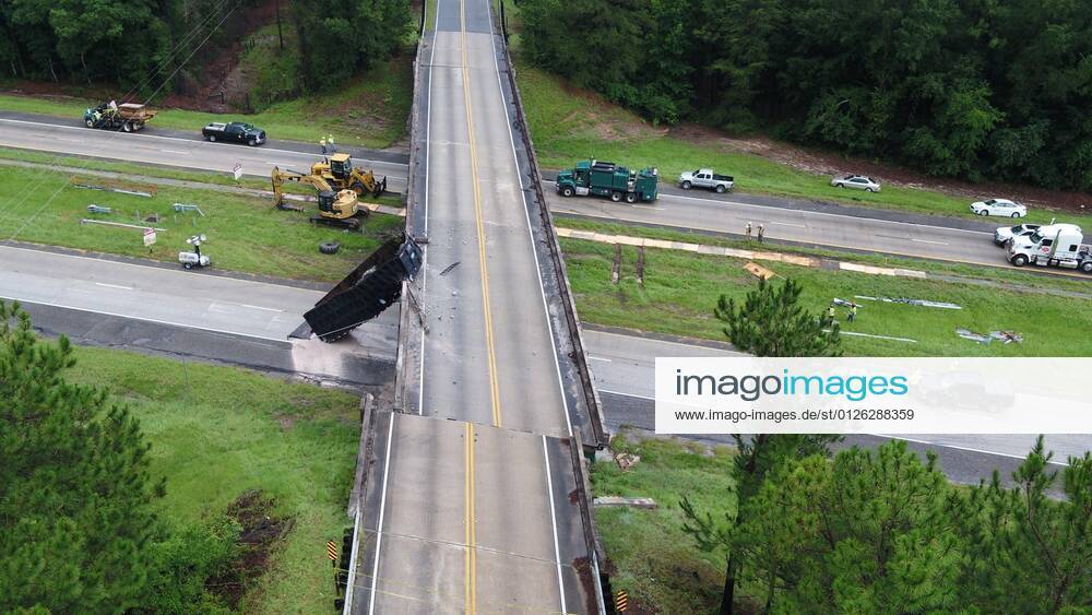 A truck hit a bridge so hard it shunted it six feet. These shocking pictures show the aftermath of the crash in Georgia, USA, on Thursday (15 July). The overpass crosses Interstate 16 in Treutlen County, which had to be closed following the accident. A Georgia Department of Transportation spokesman said a dump truck carrying large tyres was driving at between 1:00-1:30am with its dump trailer up when it struck the bridge. He explained: It actually moved the bridge off its set mark just under six feet, which is something a lot of our engineers have never seen before. They confirmed the driver was OK. Georgia DOT managed to completely demolish the bridge by Friday morning. They reported: Overnight and early Friday morn