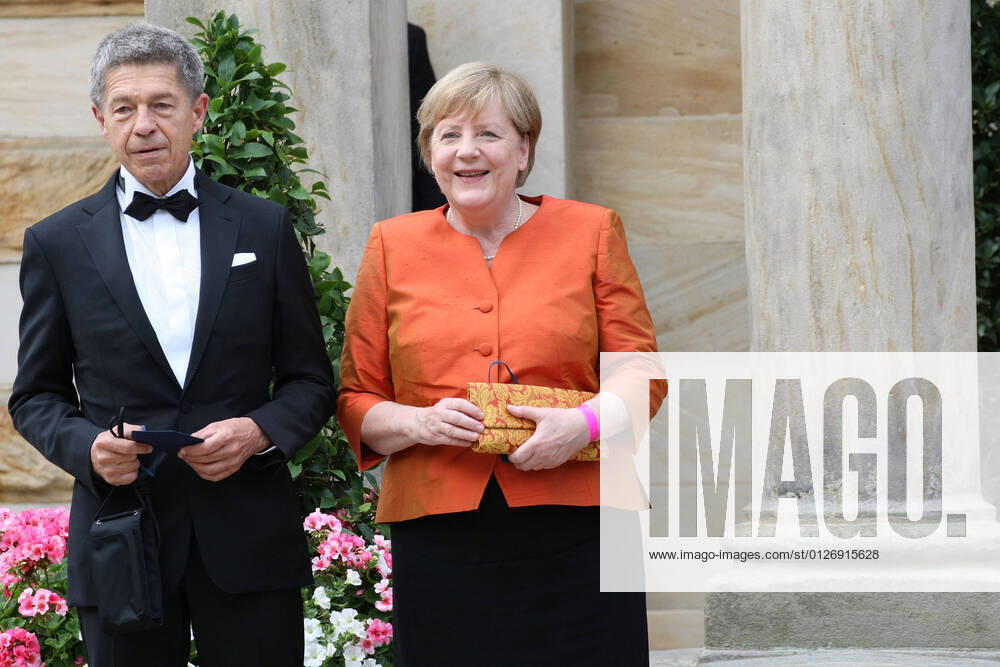 German Chancellor Angela Merkel and Husband Joachim Sauer arrive at the Bayreuther Festspiele 2021 during the Covid 19 Coronavirus Pandemie in Bayreuth , Bayern , Deutschland . July 25 , 2021.
