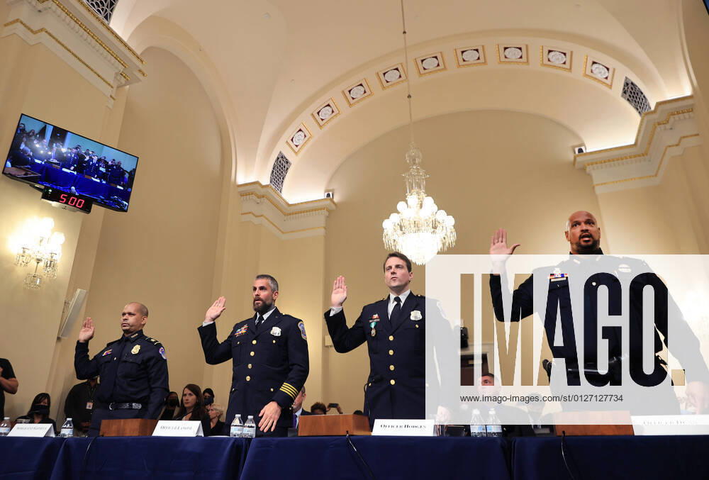 U.S. Capitol Police Sgt. Aquilino Gonell, from left, Washington Metropolitan Police Department officer Michael Fanone, Washington Metropolitan Police Department officer Daniel Hodges and U.S. Capitol Police Sgt. Harry Dunn are sworn in to testify before the Select Committee to Investigate the January attack on the U.S. Capitol at the Canon House Office Building in Washington, DC on Tuesday, on July 27, 2021. About 140 police officers were injured when they were trampled by the former President Donald Trump supporters aiming to overthrow the 2020 presidential election. Five people died. Pool WASP20210727167 ChipxSomodevilla